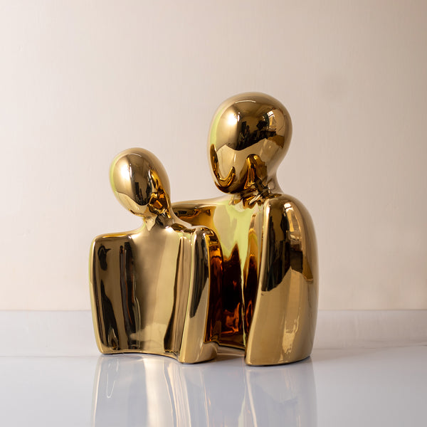 Loving Couple Decor Piece in Golden Color from Qbox